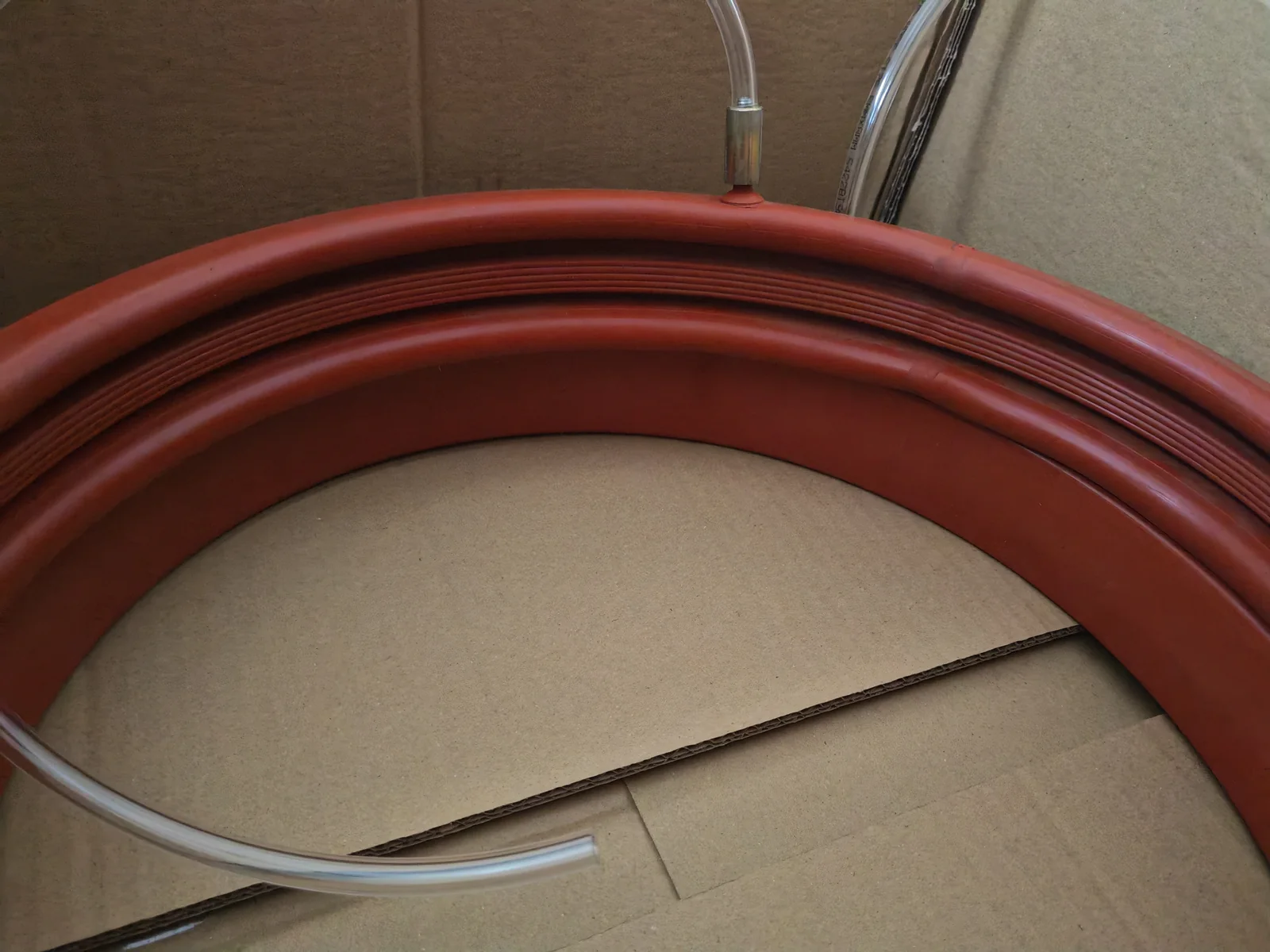 Red custom inflatable seal ring and valve configuration - view 1 Red custom inflatable seal ring and valve configuration, view 1