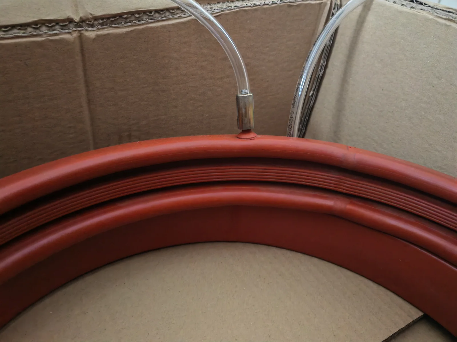 Red custom inflatable seal ring and valve configuration - view 2 Red custom inflatable seal ring and valve configuration, view 2
